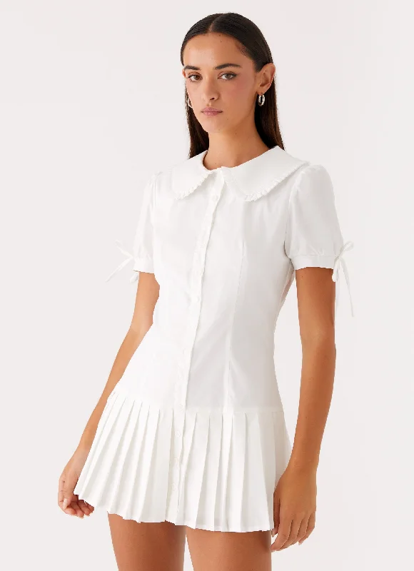 Mini dresses with pom - pom trims for a playful feel To Us Pleated Mini Dress - White