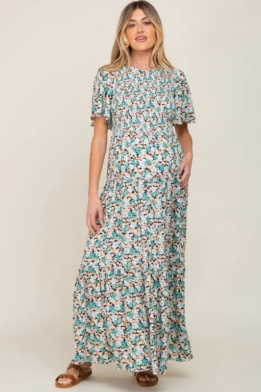Maternity dress for a baby's first visit to the museum Green Floral Smocked Tiered Maternity Maxi Dress Maternity dress for a baby's first visit to the museum Green Floral Smocked Tiered Maternity Maxi Dress