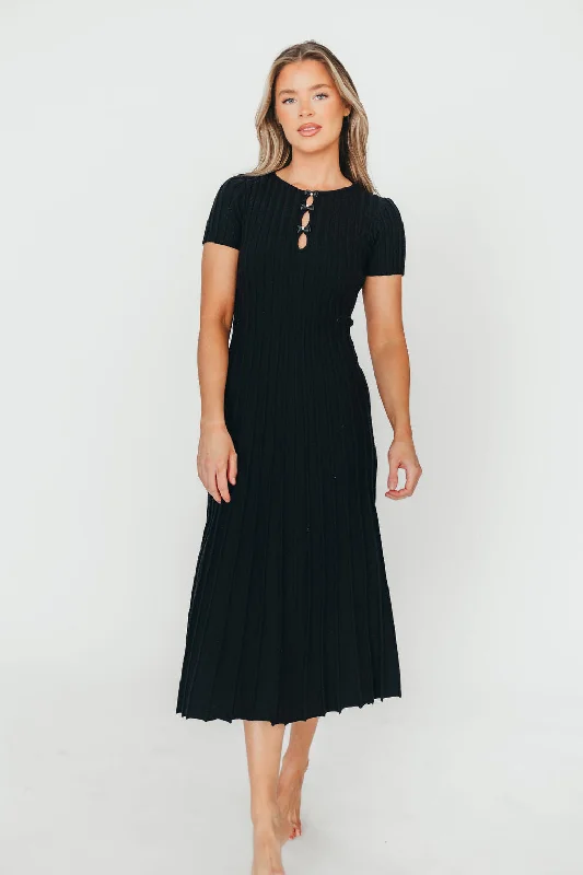 Midi dresses with abstract art prints for an artistic statement Winnie Front Bow Button Knit Midi Dress in Black - Bump Friendly Midi dresses with abstract art prints for an artistic statement Winnie Front Bow Button Knit Midi Dress in Black - Bump Friendly