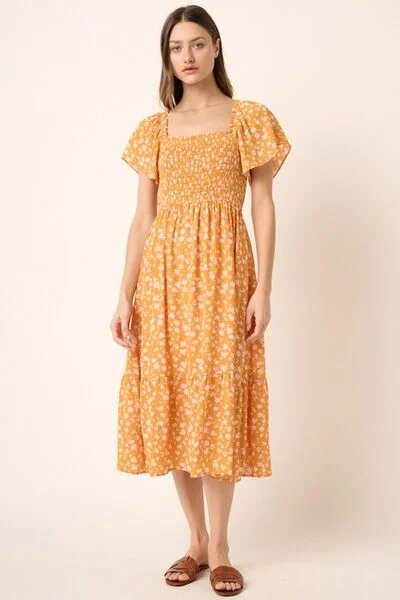 Midi dresses with patchwork patterns for a one - of - a - kind style Floral Flutter Sleeve Smocked Midi Dress