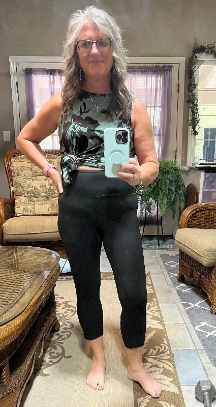 Women's Faux Leather Tight Trousers with Studded Details in Brown for an Edgy StyleCapri Leggings in Black or Charcoal - light athletic hold by Rae Mode Women's Faux Leather Tight Trousers with Studded Details in Brown for an Edgy StyleCapri Leggings in Black or Charcoal - light athletic hold by Rae Mode