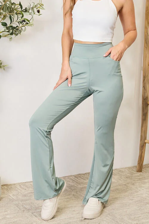 Women's High - Waisted Tight Trousers with Side Slits in Beige for a Trendy LookHeimish Yoga band Waistband Sports Pants in Sage Women's High - Waisted Tight Trousers with Side Slits in Beige for a Trendy LookHeimish Yoga band Waistband Sports Pants in Sage