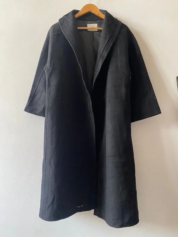 Women's overalls with a ruffled hemOvercoat