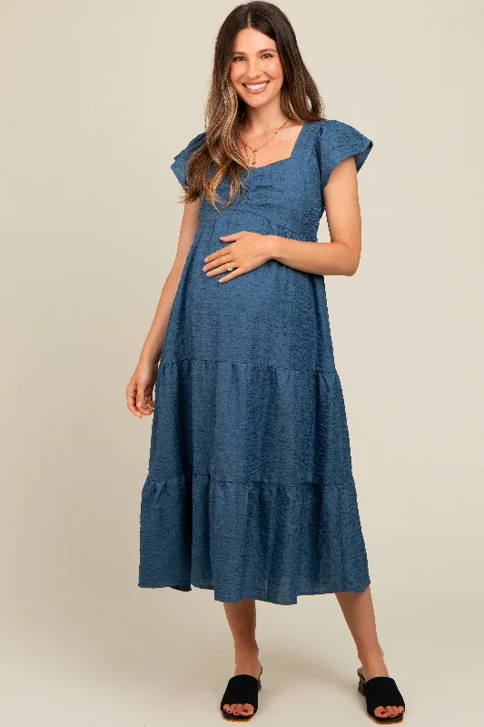 Wrap - style midi dresses in silk for a sophisticated office lookBlue Textured Sweetheart Neck Short Puff Sleeve Tiered Maternity Midi Dress