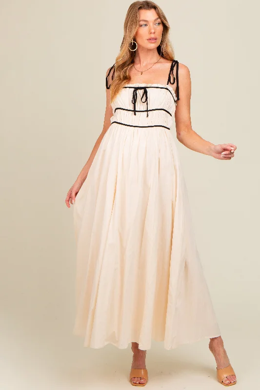 Midi dresses with asymmetric hems for a fashion - forward and dynamic appearanceCream Contrast Ribbon Trim Maternity Maxi Dress