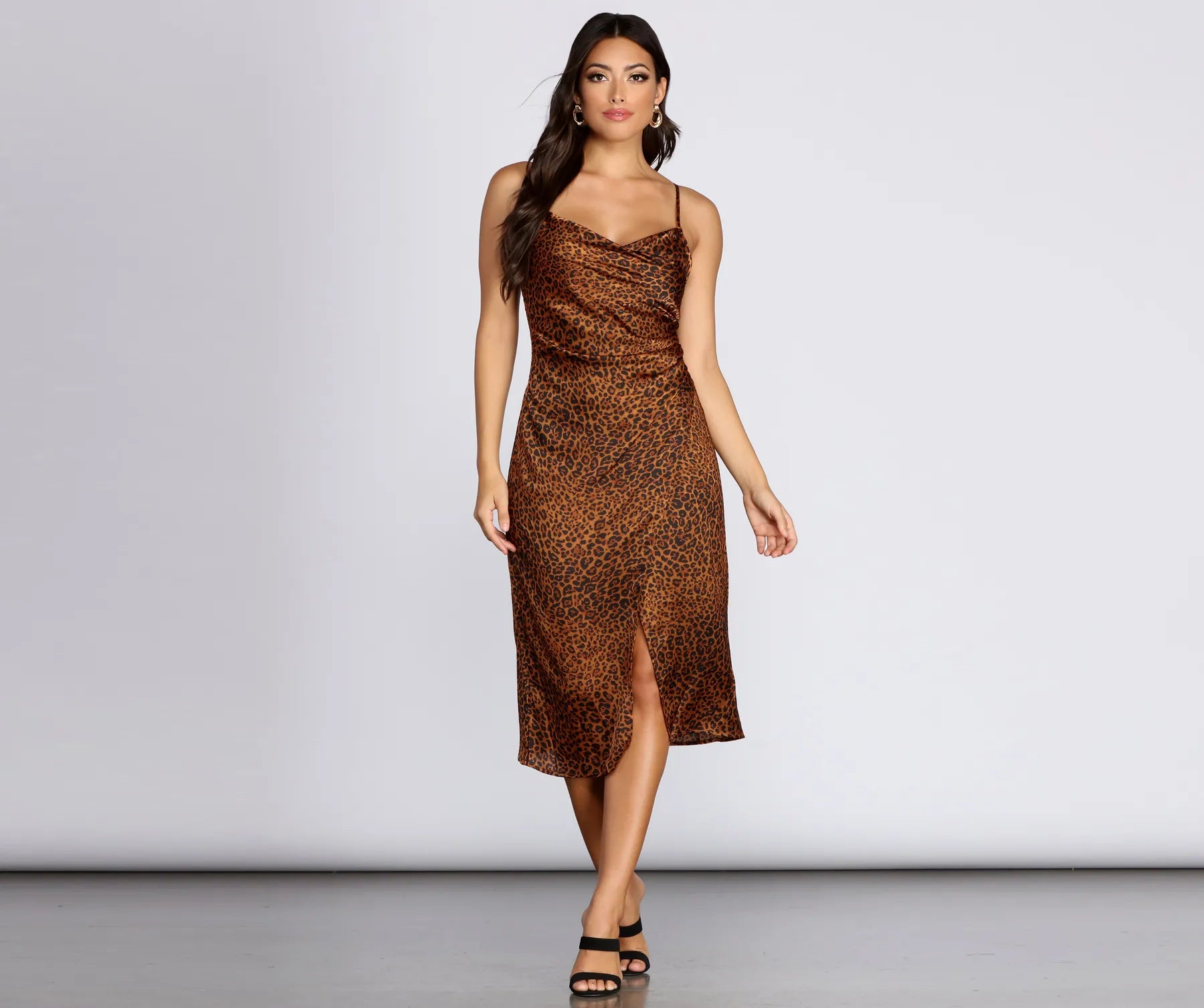 Midi dresses with ruffled sleeves for a more feminine and voluminous lookFashionably Fierce Midi Dress