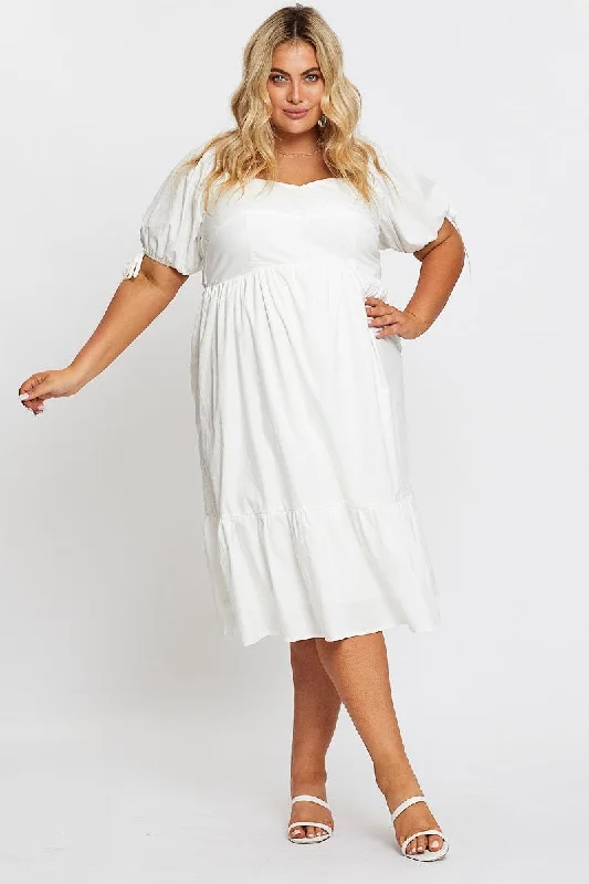 Midi dresses with polka dot prints for a playful summer outfitWhite Short Puff Sleeve Bust Detail Dress