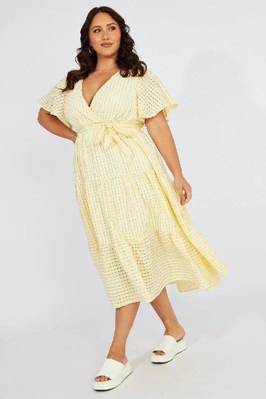 Midi dresses with geometric cutouts for a contemporary and edgy lookYellow Check Wrap Midi Dress