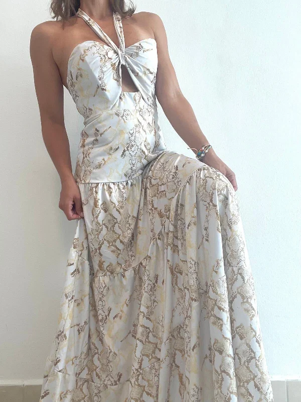 Maxi dresses with pom - pom trims for a playful and festive lookGold Snake Maxi Dress