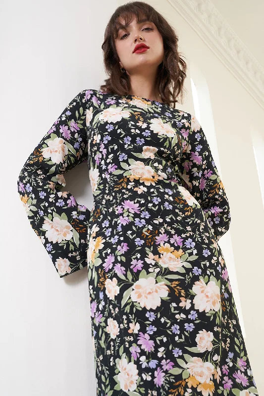 Maxi dresses with a criss - cross back for a flirty and unique detailMILANO DRESS