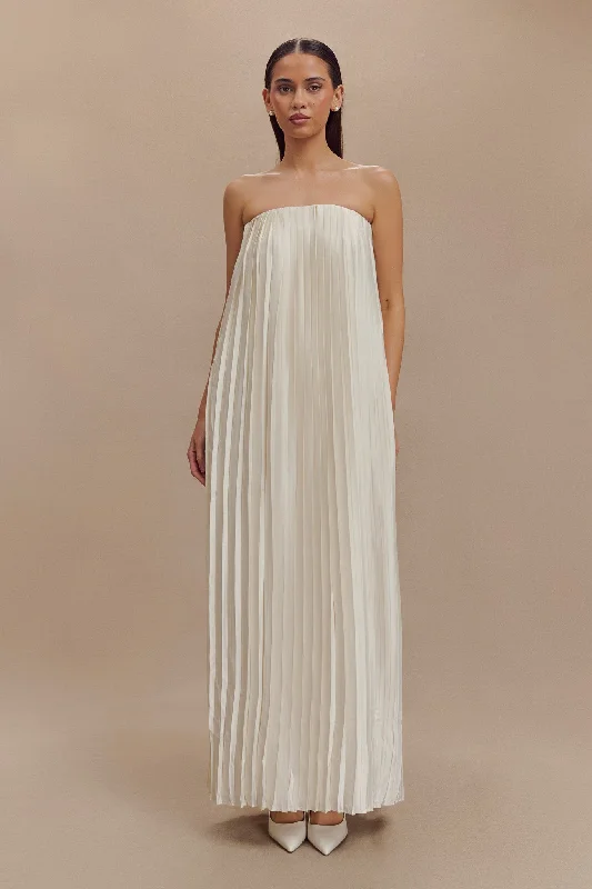 Maxi dresses with bow accents at the waist for a sweet appearanceMyrah Plisse Strapless Maxi Dress - Ivory Maxi dresses with bow accents at the waist for a sweet appearanceMyrah Plisse Strapless Maxi Dress - Ivory