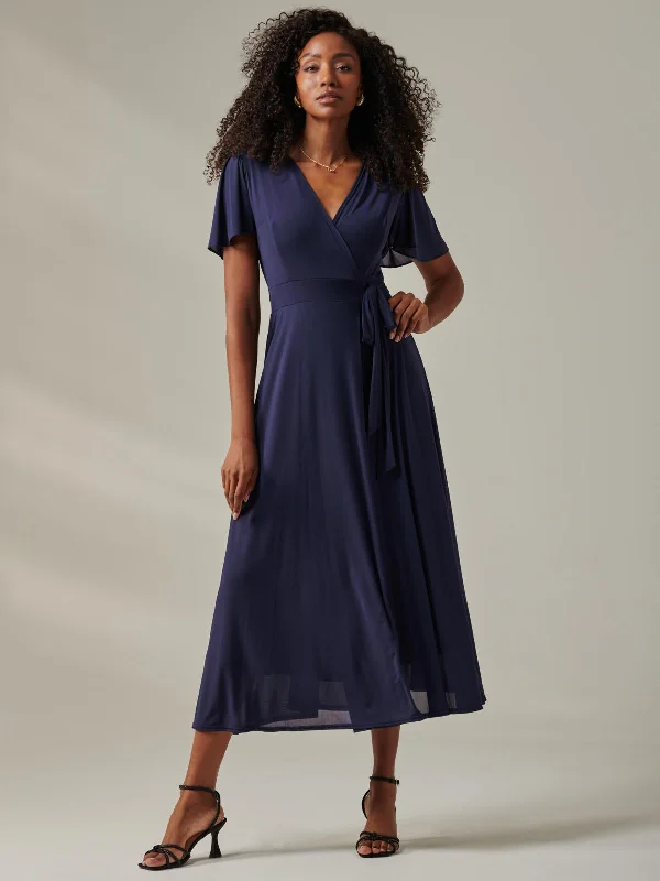 Denim maxi dresses with frayed hems for a casual lookPlain Angel Sleeve Wrapped Maxi Dress, Navy Denim maxi dresses with frayed hems for a casual lookPlain Angel Sleeve Wrapped Maxi Dress, Navy