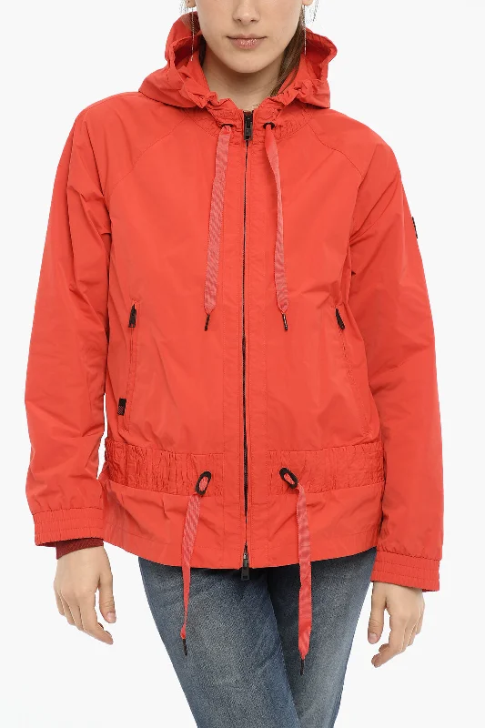 Oversized women's wool coats in a monochromatic look for a trendy outfitWoolrich Hooded ERIE Windbreaker Jacket with Ruched Details Oversized women's wool coats in a monochromatic look for a trendy outfitWoolrich Hooded ERIE Windbreaker Jacket with Ruched Details