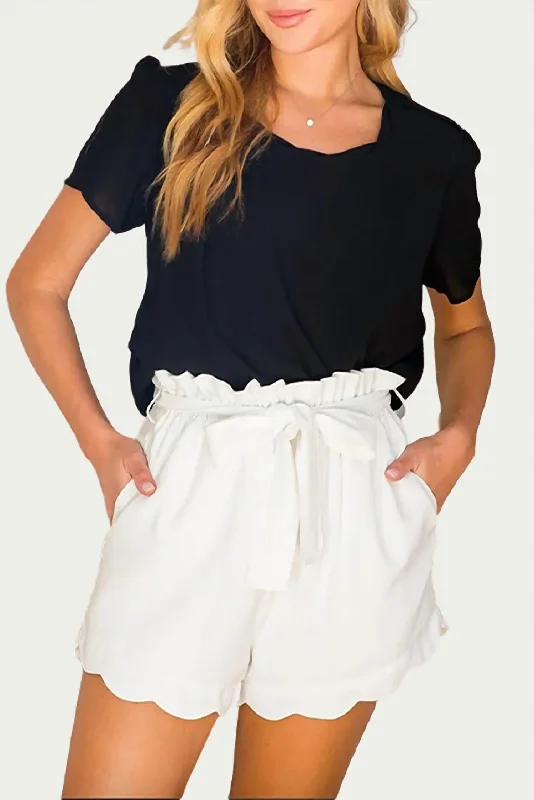 Printed Animal Print Women Shorts for a Wild and Stylish AppearanceHigh-Waisted Scallop Trim Shorts In Ivory Printed Animal Print Women Shorts for a Wild and Stylish AppearanceHigh-Waisted Scallop Trim Shorts In Ivory